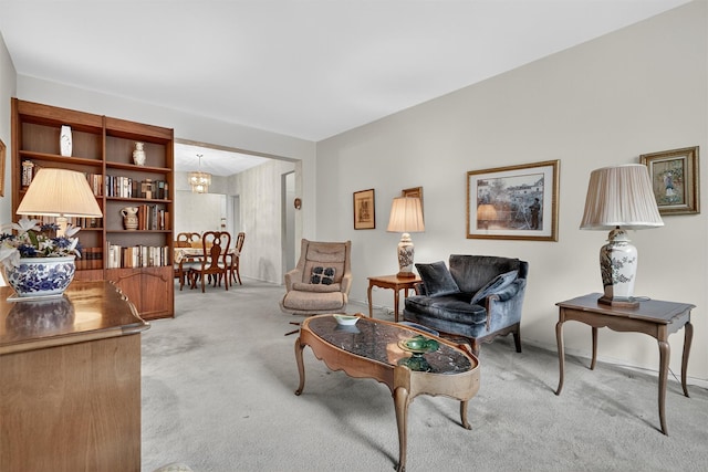 517 Riverdale Ave Unit 4A, Yonkers, NY 10705 - living area featuring light colored carpet and a chandelier