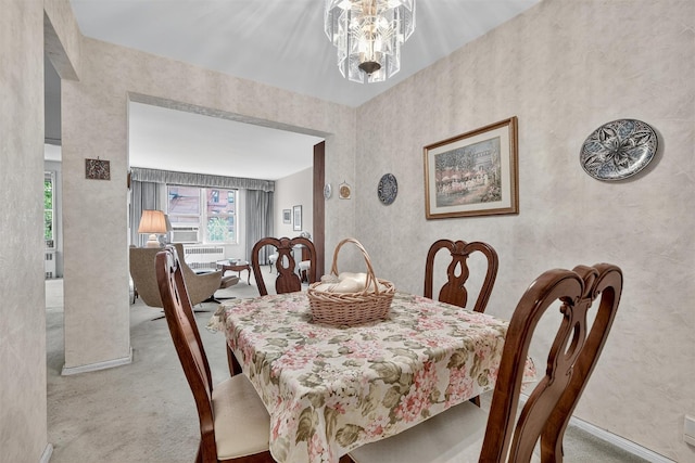 517 Riverdale Ave Unit 4A, Yonkers, NY 10705 - dining area with carpet floors, a chandelier, and wallpapered walls