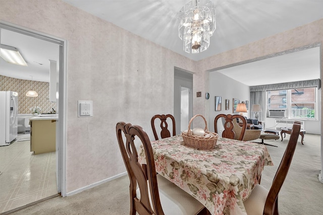 517 Riverdale Ave Unit 4A, Yonkers, NY 10705 - dining room with light colored carpet, cooling unit, and a chandelier