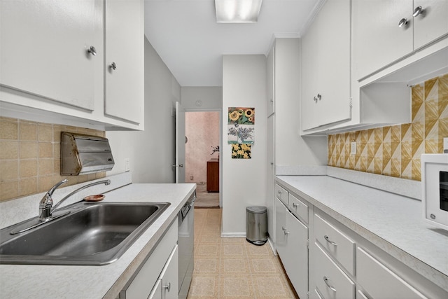 517 Riverdale Ave Unit 4A, Yonkers, NY 10705 - kitchen featuring light countertops, white cabinets, light floors, and stainless steel dishwasher