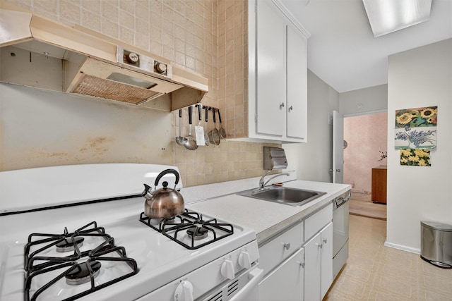 517 Riverdale Ave Unit 4A, Yonkers, NY 10705 - kitchen with white gas range oven, light countertops, dishwasher, white cabinetry, and exhaust hood
