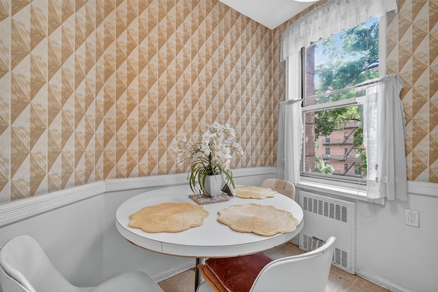 517 Riverdale Ave Unit 4A, Yonkers, NY 10705 - dining room with radiator heating unit and wallpapered walls