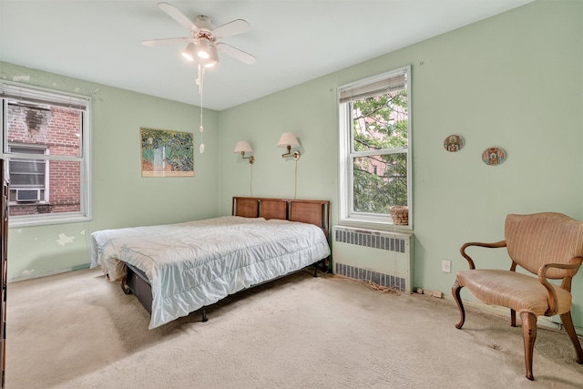 517 Riverdale Ave Unit 4A, Yonkers, NY 10705 - carpeted bedroom featuring radiator heating unit and ceiling fan