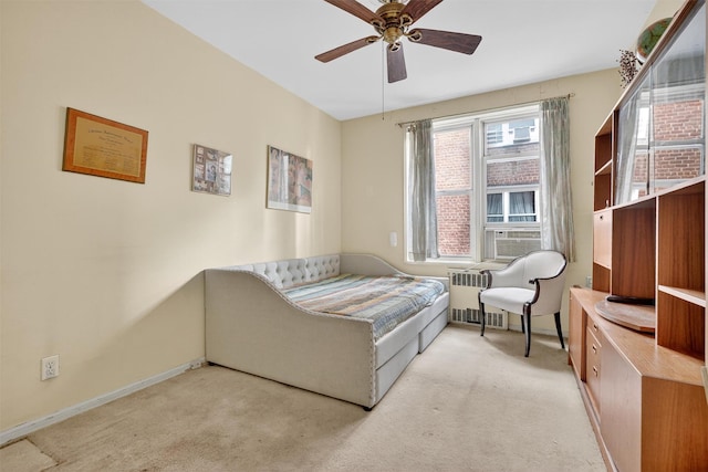 517 Riverdale Ave Unit 4A, Yonkers, NY 10705 - sitting room with radiator heating unit, a ceiling fan, carpet, and cooling unit