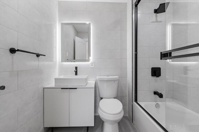 77 Bounty Ln, Jericho, NY 11753 - full bathroom with vanity, bathtub / shower combination, and tile walls