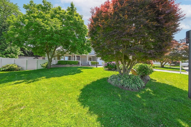 239 Walnut Rd, Glen Cove, NY 11542 - view of yard featuring covered porch