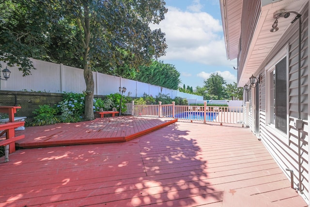 239 Walnut Rd, Glen Cove, NY 11542 - wooden deck with a fenced backyard