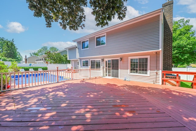 239 Walnut Rd, Glen Cove, NY 11542 - wooden deck featuring a fenced backyard and a patio area