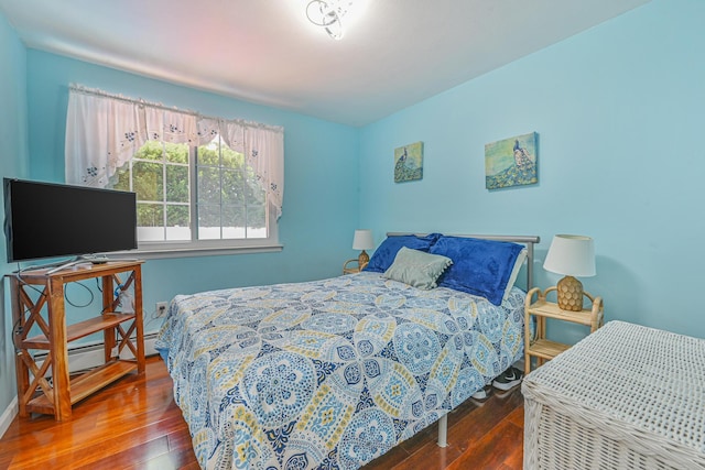 239 Walnut Rd, Glen Cove, NY 11542 - bedroom with hardwood / wood-style floors and baseboard heating