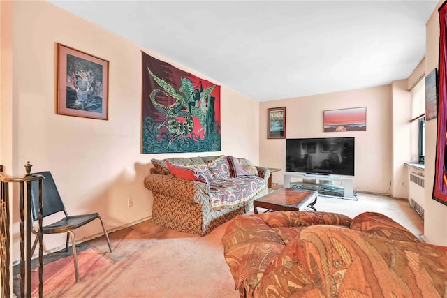 26-20 141st St Unit 2G, Flushing, NY 11354 - carpeted living area featuring radiator