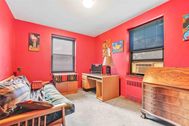 26-20 141st St Unit 2G, Flushing, NY 11354 - office area featuring radiator, light carpet, and cooling unit