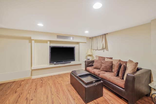 662 Rose Blvd, Baldwin, NY 11510 - living area featuring light wood-type flooring and recessed lighting