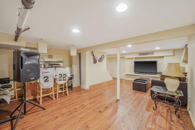 662 Rose Blvd, Baldwin, NY 11510 - workout area featuring wood finished floors and recessed lighting