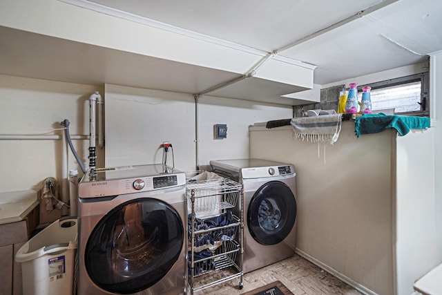 662 Rose Blvd, Baldwin, NY 11510 - laundry room featuring washer and dryer