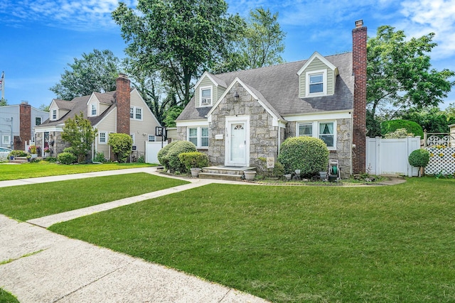 662 Rose Blvd, Baldwin, NY 11510 - view of front of property with stone siding and a chimney