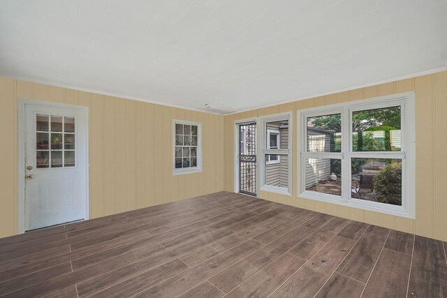 662 Rose Blvd, Baldwin, NY 11510 - empty room with ornamental molding and wood finished floors