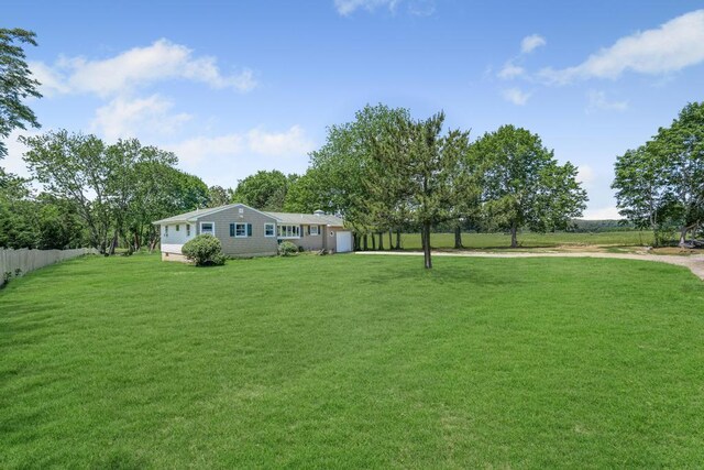 565 Barley Ln, Southold, NY 11971 - view of yard with an attached garage