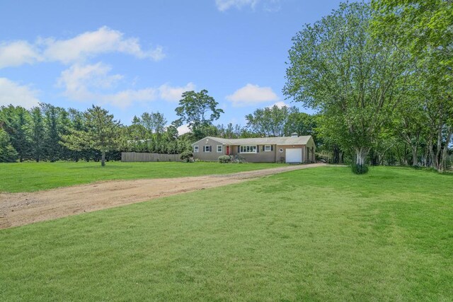 565 Barley Ln, Southold, NY 11971 - single story home with driveway, an attached garage, and a front yard