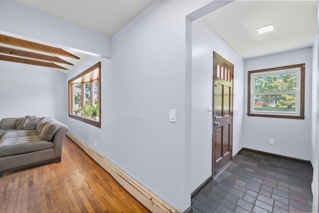 565 Barley Ln, Southold, NY 11971 - entrance foyer featuring baseboard heating and beamed ceiling