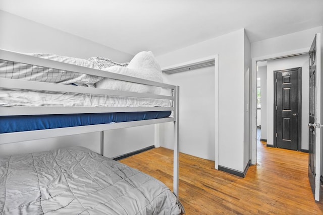 565 Barley Ln, Southold, NY 11971 - bedroom with wood finished floors