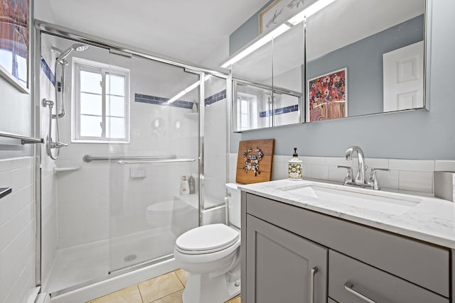 114 Jervis Ave Unit 114, Farmingdale, NY 11735 - full bathroom with vanity, a stall shower, and tile patterned floors