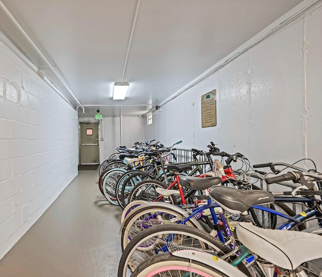 114 Jervis Ave Unit 114, Farmingdale, NY 11735 - garage featuring concrete block wall and bike storage