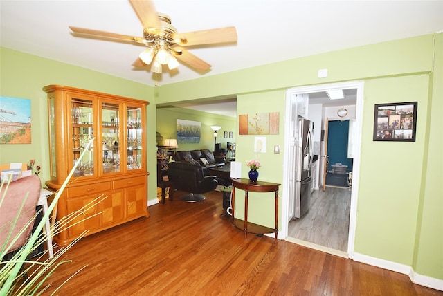 18-70 211th St Unit 5K, Bayside, NY 11360 - hallway featuring wood finished floors and baseboards