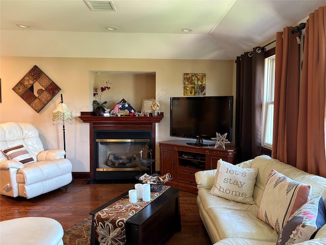 4218 217th St, Bayside, NY 11361 - living area with wood finished floors, plenty of natural light, a glass covered fireplace, and recessed lighting