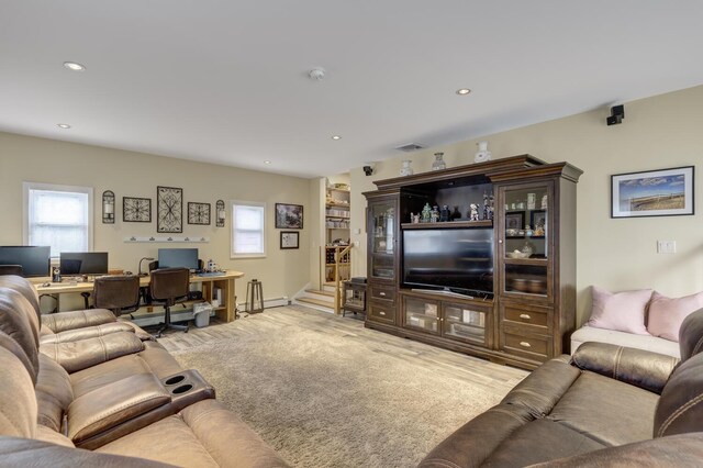18 Loring Rd, Levittown, NY 11756 - living room featuring an office area, plenty of natural light, recessed lighting, and a baseboard radiator