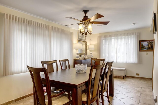 18 Loring Rd, Levittown, NY 11756 - dining room featuring ceiling fan and light tile patterned flooring
