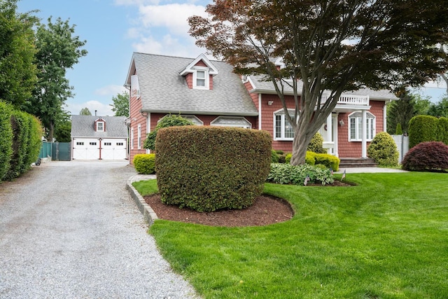 18 Loring Rd, Levittown, NY 11756 - view of front of property with roof with shingles and a garage