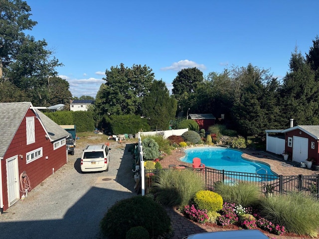 18 Loring Rd, Levittown, NY 11756 - view of swimming pool with a shed