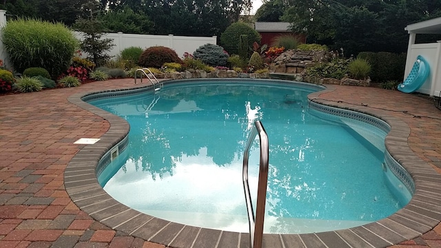 18 Loring Rd, Levittown, NY 11756 - view of pool with a patio area
