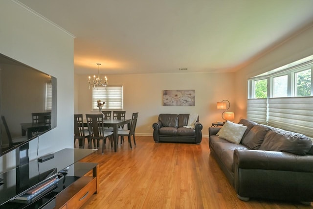 15115 25th Ave, Whitestone, NY 11357 - living room featuring a chandelier and light wood-type flooring