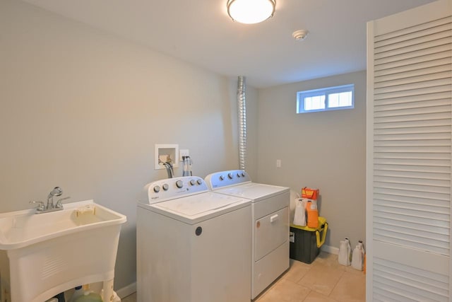 15115 25th Ave, Whitestone, NY 11357 - laundry area with washer and clothes dryer and light tile patterned floors