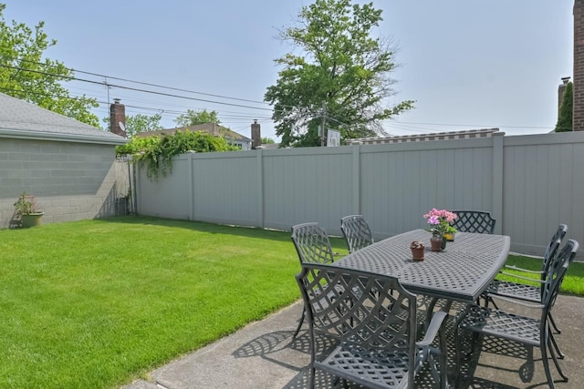 15115 25th Ave, Whitestone, NY 11357 - fenced backyard featuring outdoor dining space