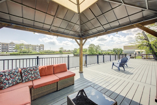 615 Pearl St, Oceanside, NY 11572 - wooden deck featuring an outdoor living space, a gazebo, and a water view