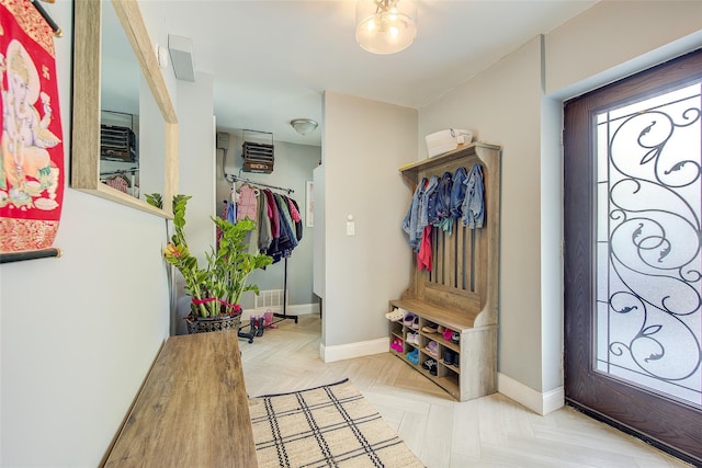 615 Pearl St, Oceanside, NY 11572 - mudroom featuring baseboards