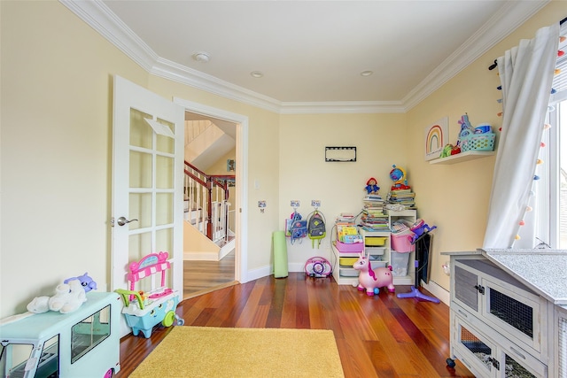 615 Pearl St, Oceanside, NY 11572 - rec room featuring crown molding and wood finished floors