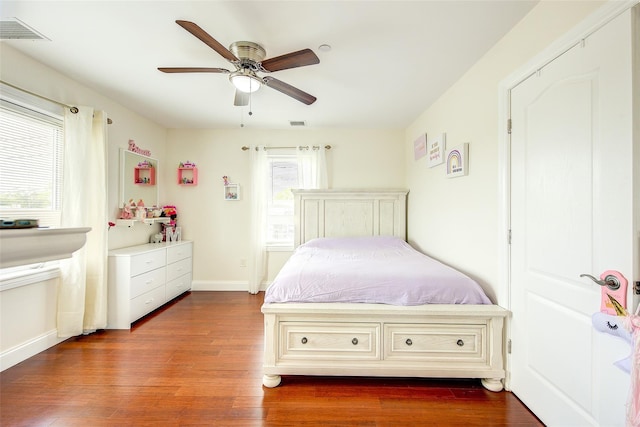 615 Pearl St, Oceanside, NY 11572 - bedroom with dark wood-style flooring and a ceiling fan