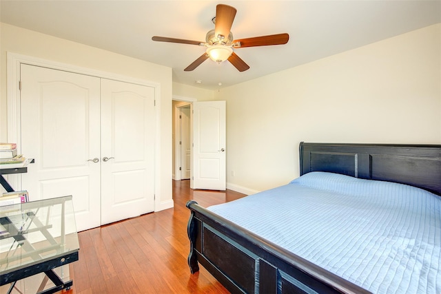 615 Pearl St, Oceanside, NY 11572 - bedroom featuring wood finished floors, a closet, and a ceiling fan