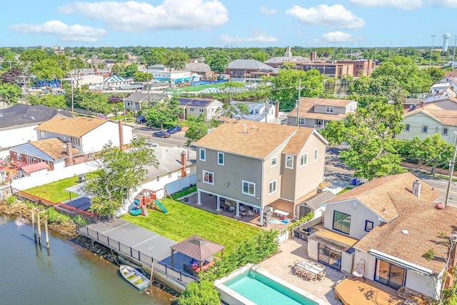 615 Pearl St, Oceanside, NY 11572 - aerial perspective of suburban area with a large body of water