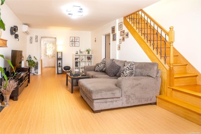 60-09 170th St, Flushing, NY 11365 - living room with light wood-type flooring, stairway, and a wall mounted air conditioner