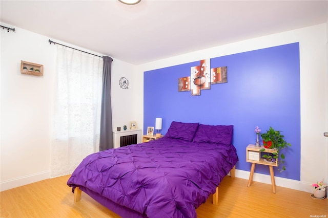 60-09 170th St, Flushing, NY 11365 - bedroom with wood finished floors and baseboards