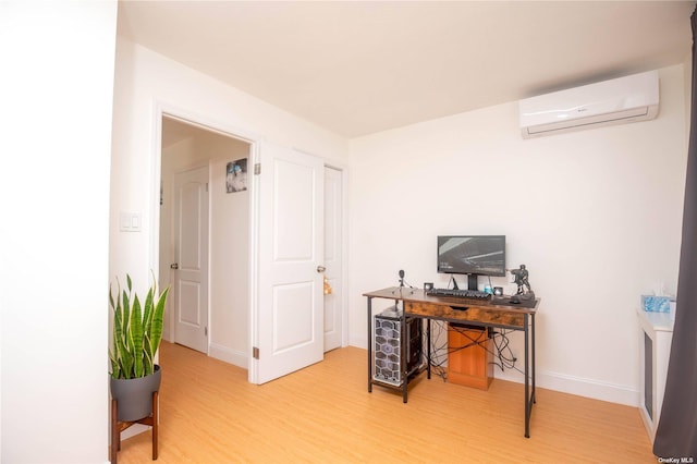 60-09 170th St, Flushing, NY 11365 - office with a wall mounted air conditioner and light wood finished floors