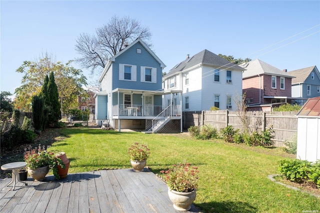 60-09 170th St, Flushing, NY 11365 - rear view of house with stairway, a residential view, and a deck