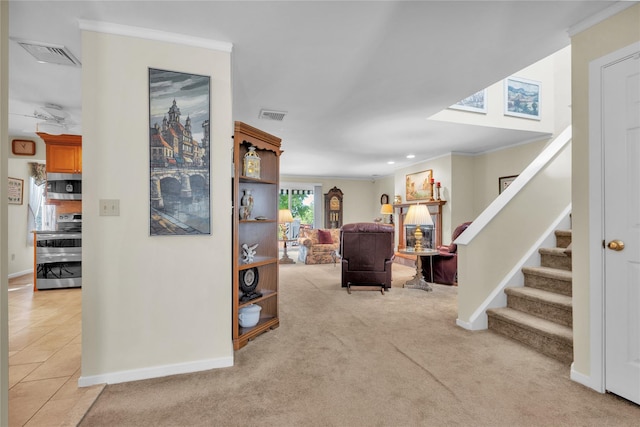 182 Fairway Dr, Carmel, NY 10512 - living area featuring stairs, ornamental molding, and light carpet