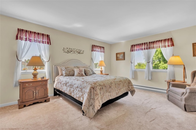 182 Fairway Dr, Carmel, NY 10512 - bedroom with a baseboard radiator and light carpet