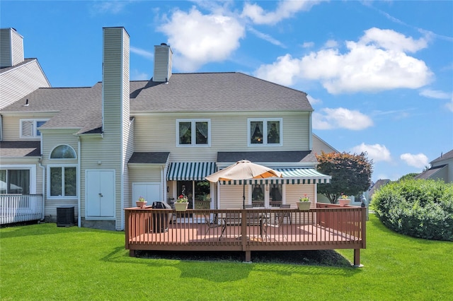 182 Fairway Dr, Carmel, NY 10512 - rear view of house featuring a wooden deck, a lawn, and a shingled roof