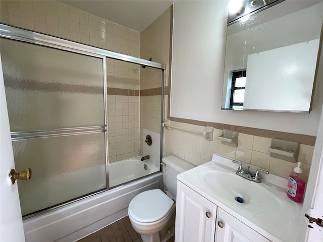 4260 Colden St Unit 4B, Flushing, NY 11355 - bathroom featuring vanity, enclosed tub / shower combo, and tile walls